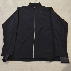 Woman's Nike windbreaker.